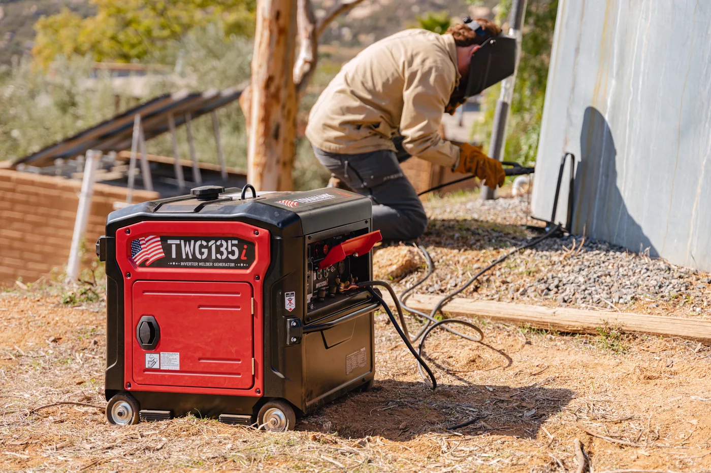 Tomahawk TWG135 welder generator powering a welder at a retaining wall